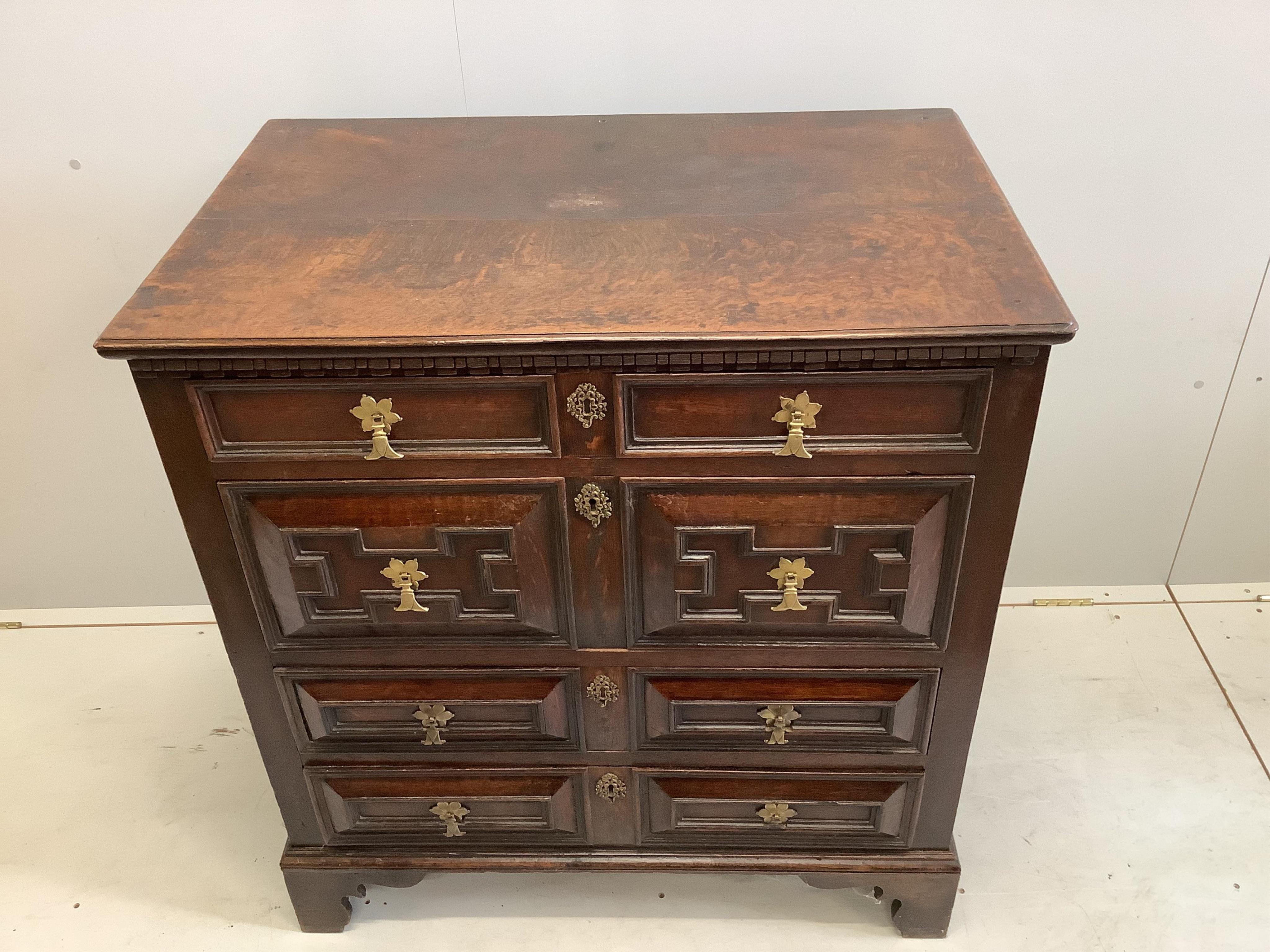 A Jacobean oak chest of drawers, width 91cm, depth 58cm, height 99cm. Condition - fair